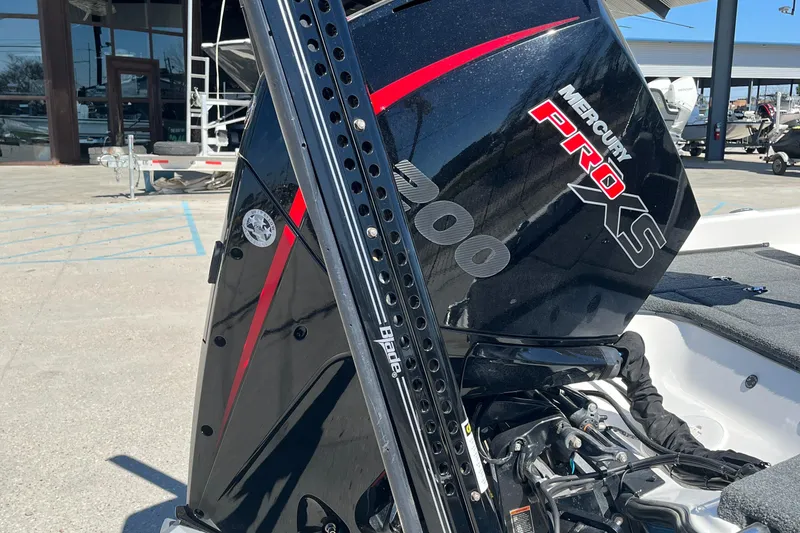 Slide: The Image of 2007 Triton 190 FS boat with Mercury Pro XS engine, outdoor setting. - 16