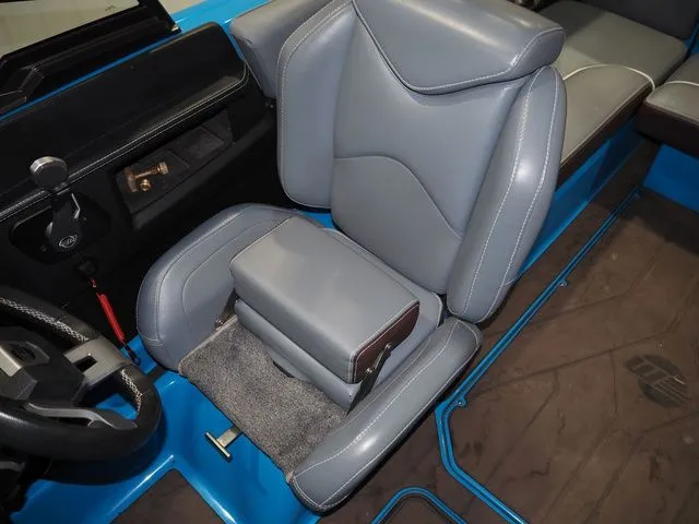 Slide: The Image of Interior of 2020 Malibu Wakesetter 22 MXZ with gray leather seats. - 18
