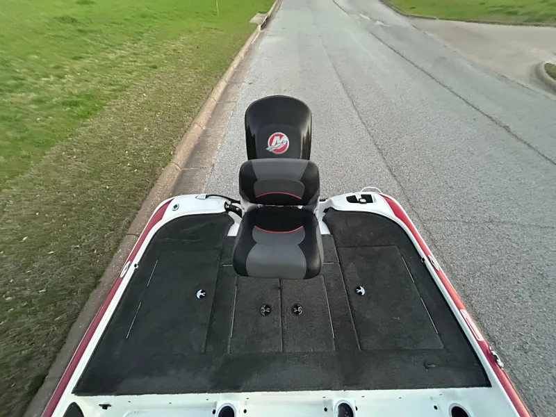 Slide: The Image of 2015 Nitro Z7 boat with dual seats on a road, surrounded by grass. - 19