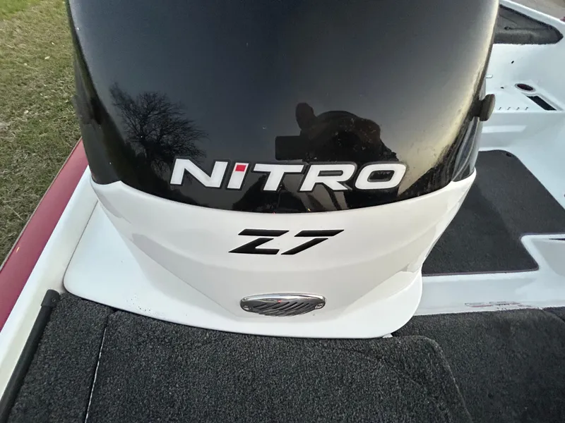 Slide: The Image of 2015 Nitro Z7 boat engine cover with logo, black and white design. - 20