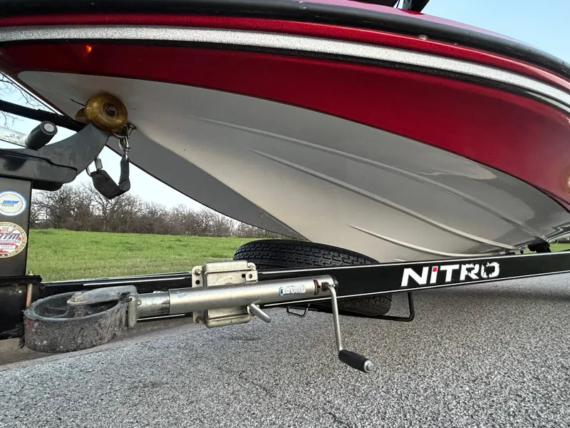 Slide: The Image of 2015 Nitro Z7 boat on trailer, showing hull and hitch details. - 37