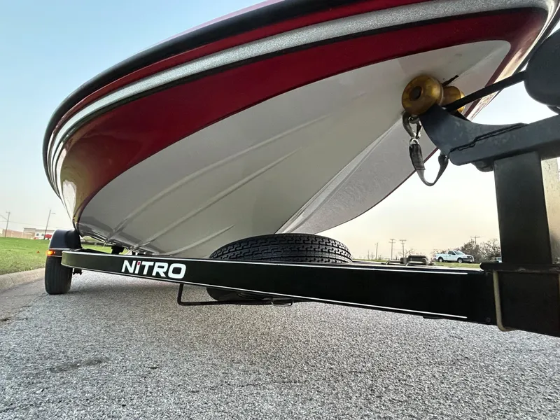 Slide: The Image of 2015 Nitro Z7 boat on trailer, close-up view from below. - 38