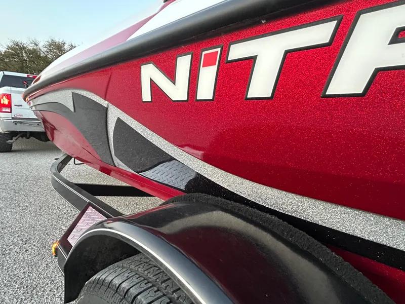 Slide: The Image of Red Nitro Z7 boat trailer, 2015 model, with bold lettering and sleek design. - 41