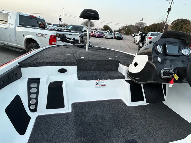 Slide: The Image of 2015 Nitro Z7 boat interior with steering console and seating area. - 51