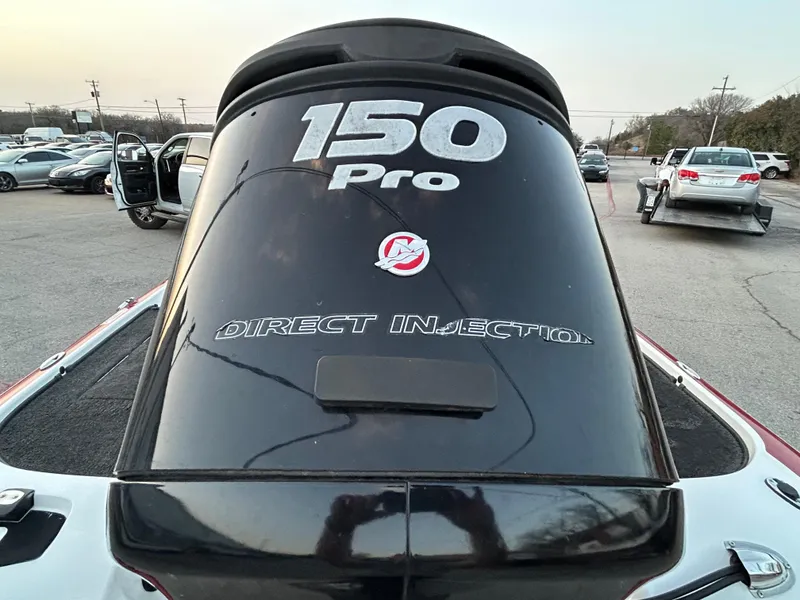 Slide: The Image of Outboard motor with "150 Pro" and "Direct Injection" text on a 2015 Nitro Z7 boat. - 53