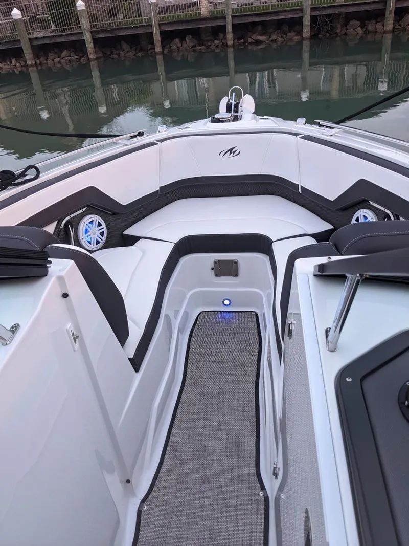 Slide: The Image of 2022 Monterey 258 Super Sport boat interior with sleek seating and modern design. - 15