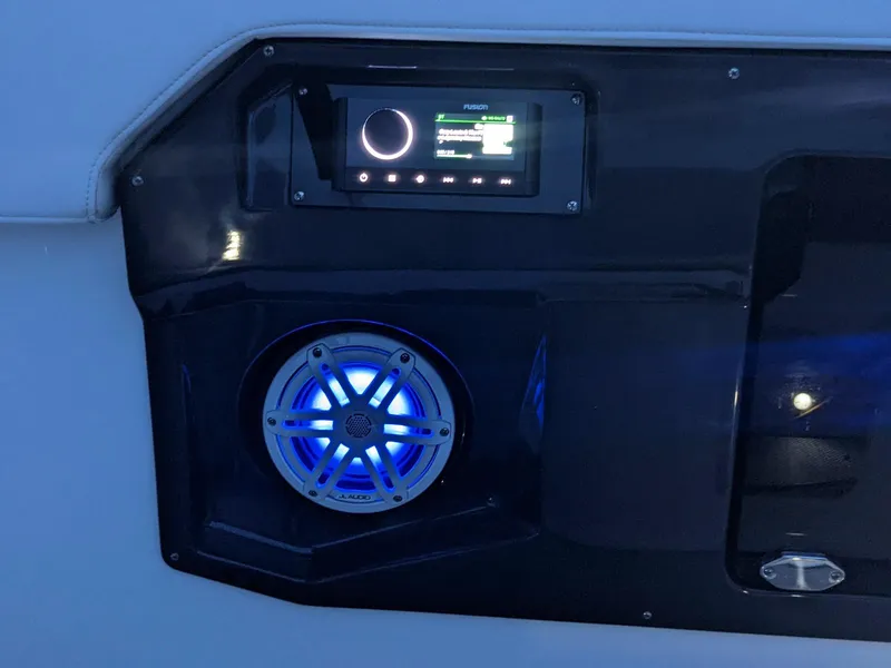 Slide: The Image of 2022 Monterey 258 Super Sport boat audio system with illuminated speaker and control panel. - 17