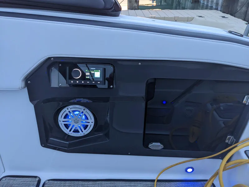 Slide: The Image of 2022 Monterey 258 Super Sport boat interior with audio system and speaker. - 19