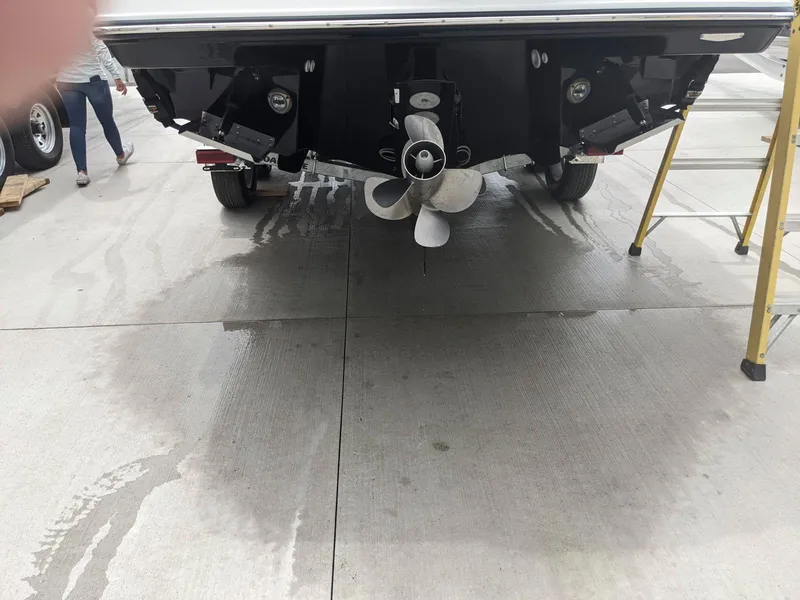 Slide: The Image of 2022 Monterey 258 Super Sport boat propeller and stern on a concrete surface. - 24