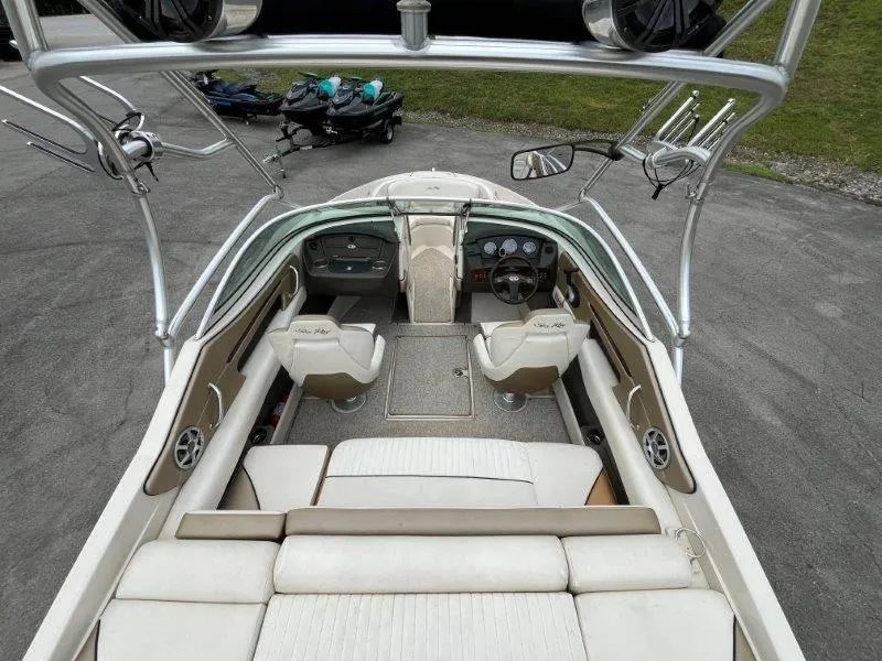 Slide: The Image of 2007 Sea Ray 210 Select boat interior with seating and dashboard view. - 29