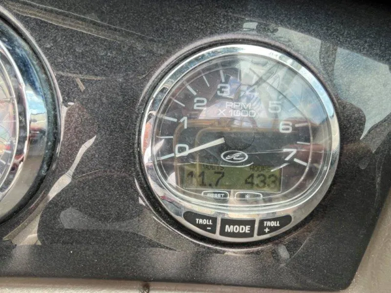 Slide: The Image of Close-up of 2007 Sea Ray 210 Select tachometer displaying RPM and digital readouts. - 38