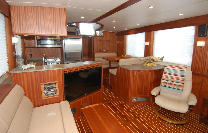 Slide: The Image of Luxurious interior of 2015 American Tug 485 with wood paneling and modern amenities. - 22