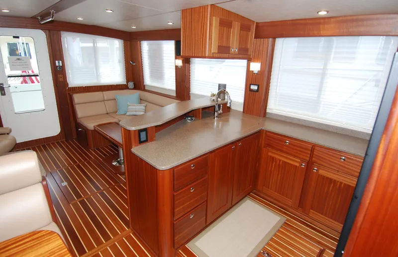 Slide: The Image of Luxurious interior of 2015 American Tug 485 with wood finishes and modern kitchen. - 37