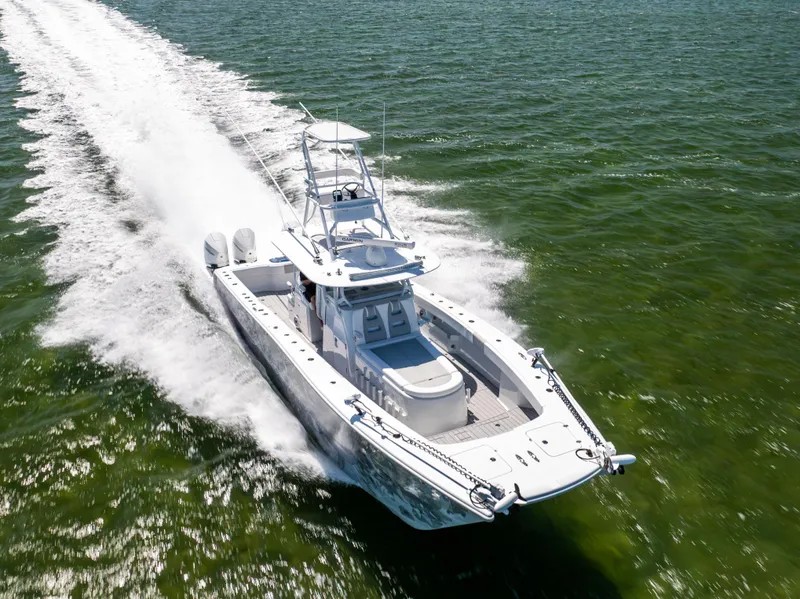 Slide: The Image of 2023 Freeman 37 VH boat cruising on open water, aerial view. - 13