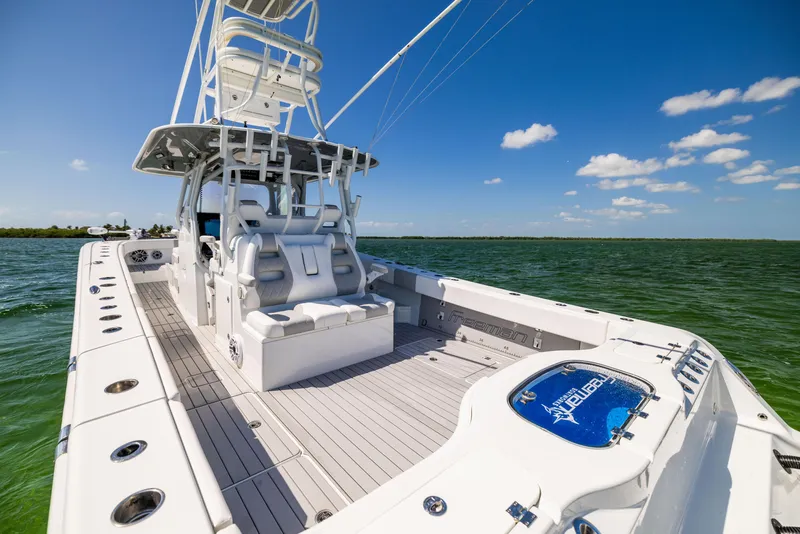 Slide: The Image of 2023 Freeman 37 VH boat on open water, featuring spacious deck and modern design. - 21