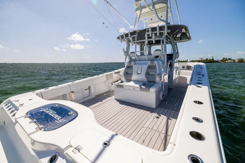 Slide: The Image of 2023 Freeman 37 VH boat with spacious deck and seating on open water. - 22