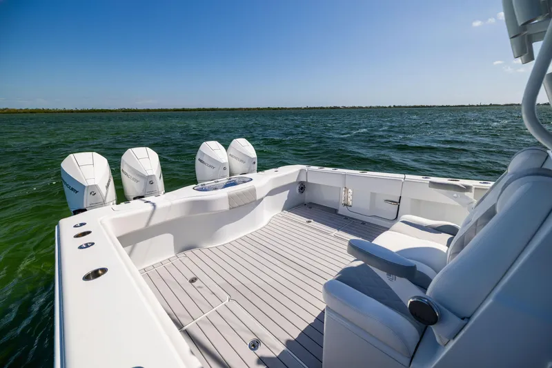 Slide: The Image of Freeman 37 VH 2023 boat with four engines on open water. - 25