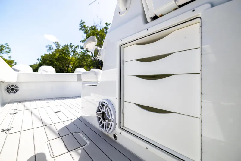 Slide: The Image of Freeman 37 VH 2023 boat deck with storage drawers and speaker system. - 34