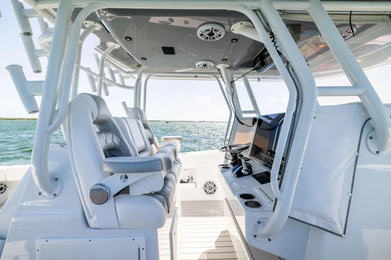 Slide: The Image of 2023 Freeman 37 VH boat interior with modern seating and navigation equipment. - 36