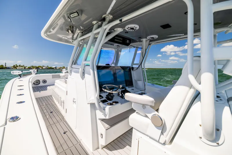 Slide: The Image of 2023 Freeman 37 VH boat interior with modern helm and ocean view. - 40