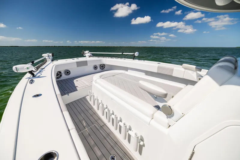 Slide: The Image of 2023 Freeman 37 VH boat deck with seating, rod holders, and ocean view. - 43