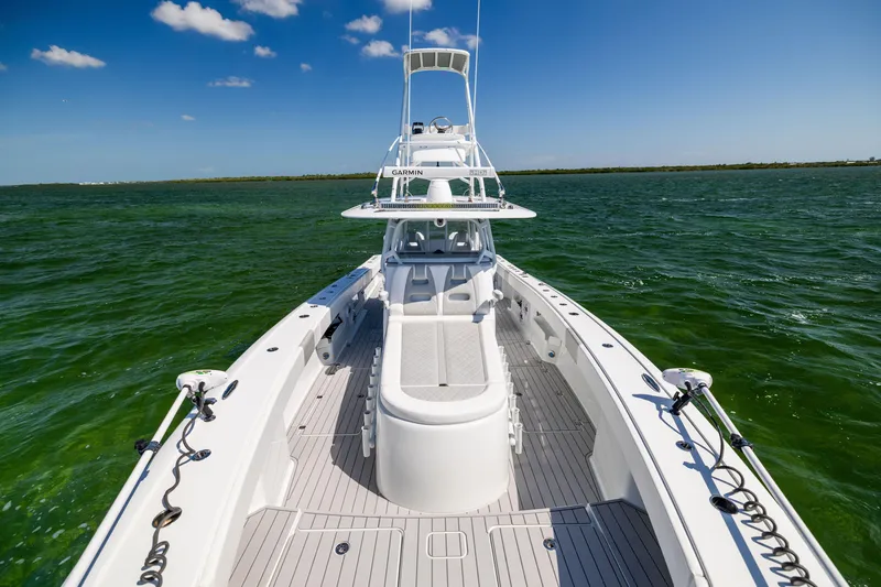 Slide: The Image of 2023 Freeman 37 VH boat on open water under clear blue sky. - 48