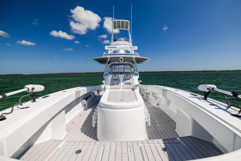 Slide: The Image of 2023 Freeman 37 VH boat on open water under clear blue sky. - 49