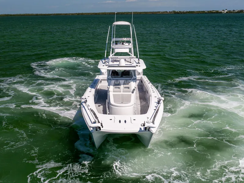 Slide: The Image of 2023 Freeman 37 VH boat cruising on open water. - 6