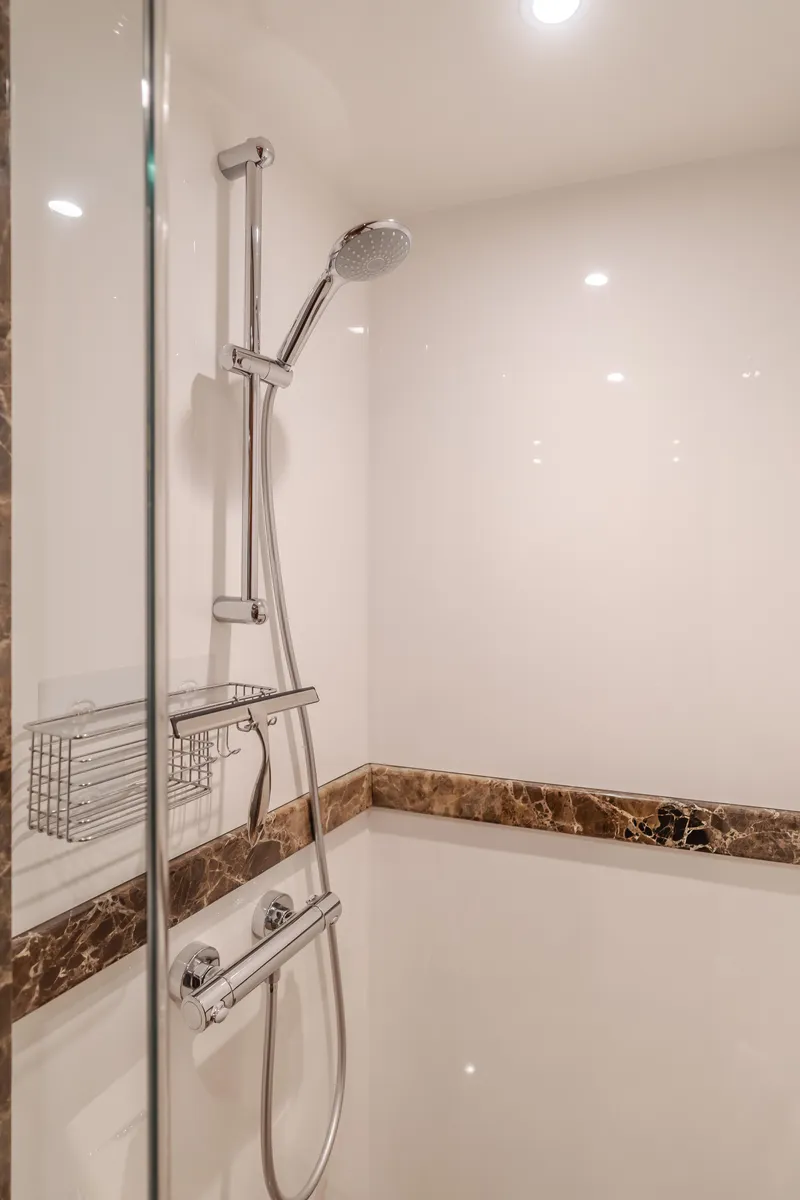 Slide: The Image of Luxurious shower in 2015 Ocean Alexander 72 yacht, featuring modern fixtures and elegant design. - 32
