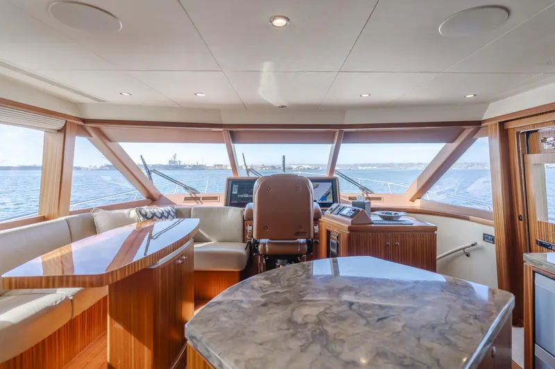 Slide: The Image of Luxurious interior of 2015 Ocean Alexander 72 yacht with panoramic windows and elegant furnishings. - 39