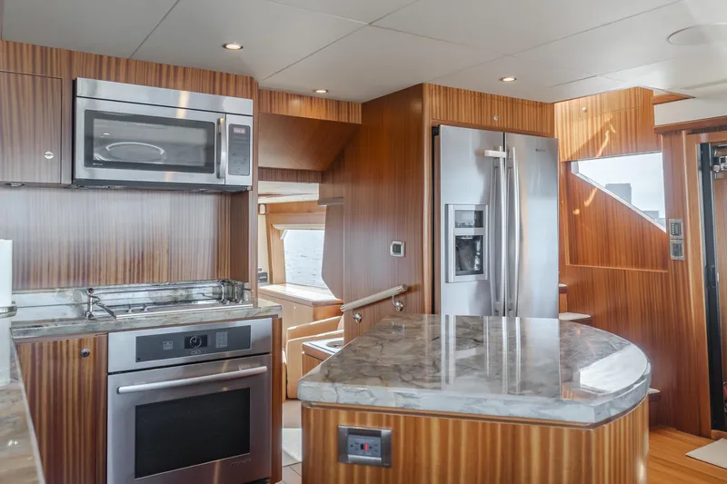 Slide: The Image of Luxurious kitchen interior of 2015 Ocean Alexander 72 yacht with modern appliances. - 44