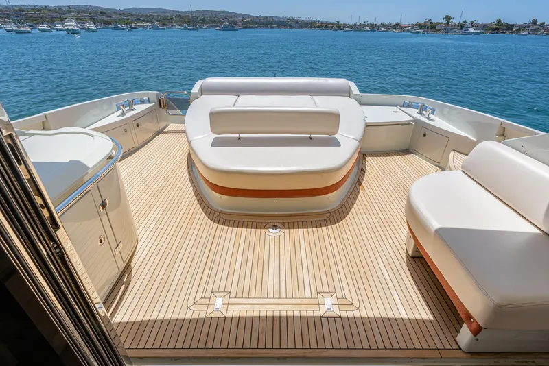 Slide: The Image of Luxurious 2009 Azimut 62S yacht deck with elegant seating and scenic ocean view. - 14