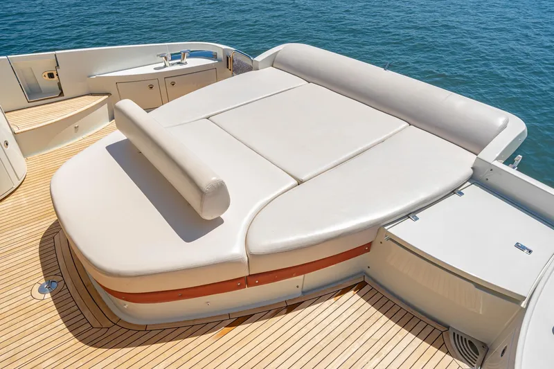 Slide: The Image of Luxurious sunbed on 2009 Azimut 62S yacht, featuring elegant design and teak decking. - 15