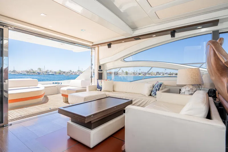 Slide: The Image of Luxurious interior of 2009 Azimut 62S yacht with ocean view and elegant white seating. - 19
