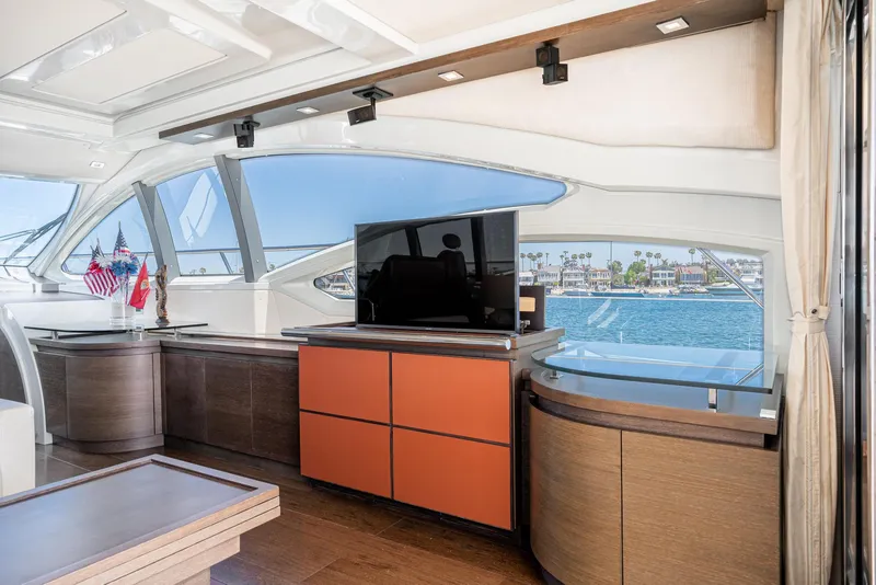 Slide: The Image of Luxurious interior of 2009 Azimut 62S yacht with modern furnishings and ocean view. - 21
