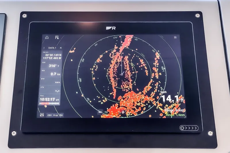 Slide: The Image of Radar display on 2009 Azimut 62S yacht, showing navigation data and sea conditions. - 26