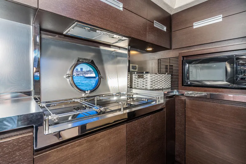 Slide: The Image of Luxurious kitchen interior of 2009 Azimut 62S yacht with modern appliances and ocean view. - 30
