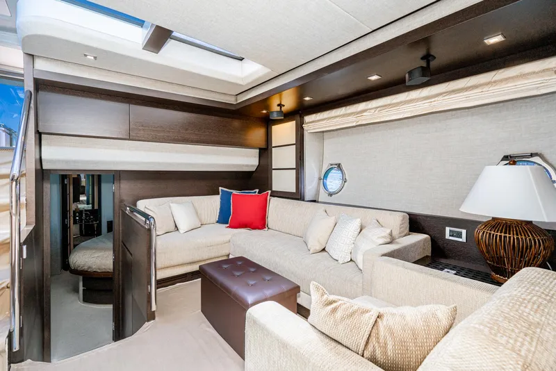Slide: The Image of Luxurious interior of a 2009 Azimut 62S yacht with elegant seating and modern decor. - 33