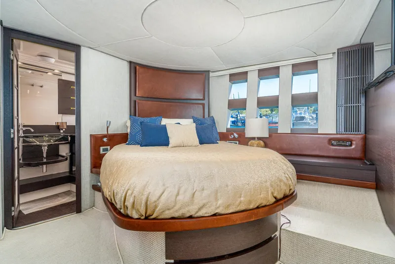 Slide: The Image of Luxurious bedroom interior of 2009 Azimut 62S yacht with modern design and cozy bedding. - 36