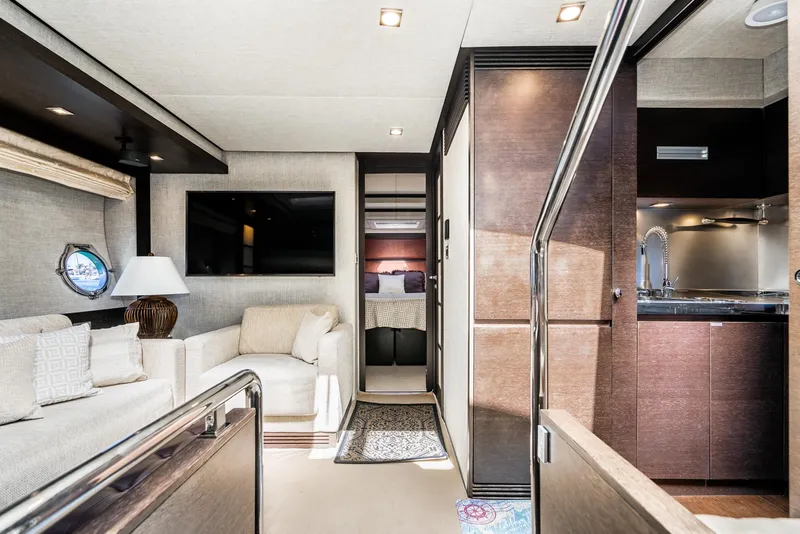 Slide: The Image of Luxurious interior of a 2009 Azimut 62S yacht with modern furnishings and sleek design. - 39