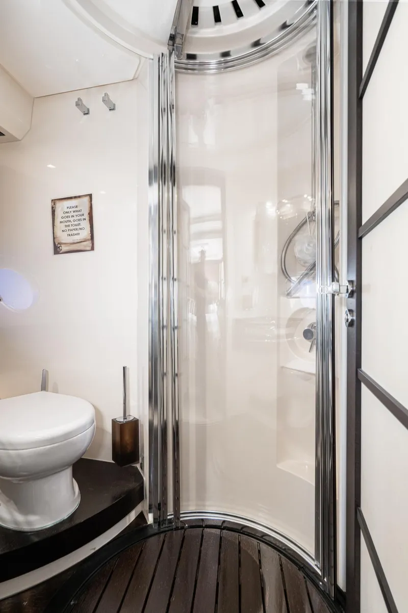 Slide: The Image of Luxurious bathroom in 2009 Azimut 62S yacht with modern shower and sleek design. - 43