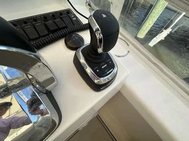 Slide: The Image of 2021 AmeraCat 27 Gen II DC boat control panel with joystick and switches. - 11