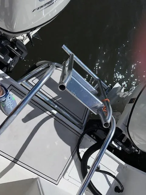 Slide: The Image of 2021 AmeraCat 27 Gen II DC boat with dual engines and stainless steel ladder. - 16