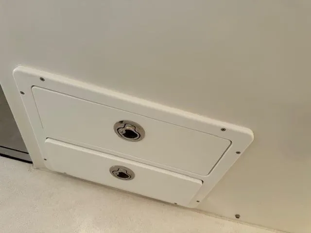 Slide: The Image of Storage compartment on 2021 AmeraCat 27 Gen II DC boat. - 17