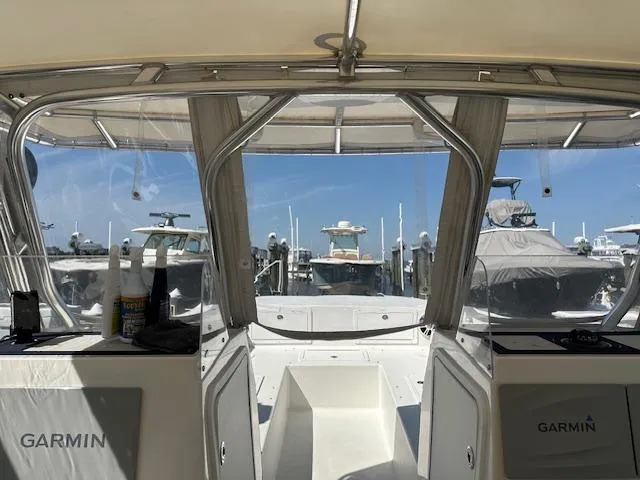 Slide: The Image of Interior view of 2021 AmeraCat 27 Gen II DC boat with Garmin equipment. - 18