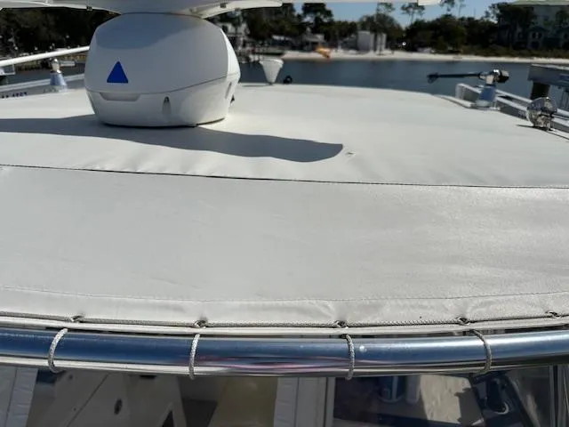 Slide: The Image of 2021 AmeraCat 27 Gen II DC boat with radar, docked in a marina. - 21