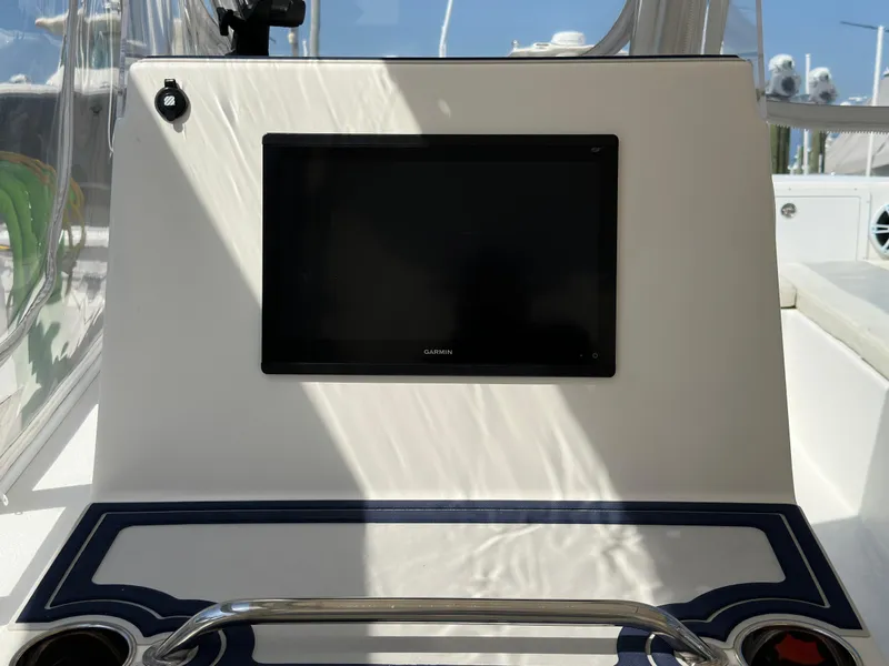 Slide: The Image of 2021 AmeraCat 27 Gen II DC boat dashboard with a mounted screen display. - 28