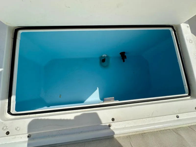 Slide: The Image of Open storage compartment on 2021 AmeraCat 27 Gen II DC boat. - 38