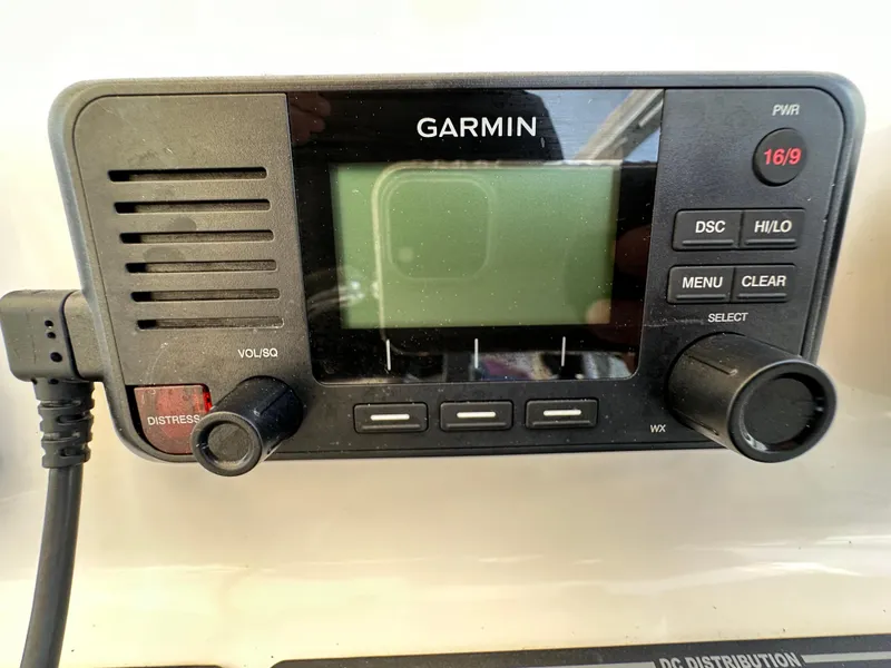 Slide: The Image of Garmin marine radio on 2021 AmeraCat 27 Gen II DC boat dashboard. - 42