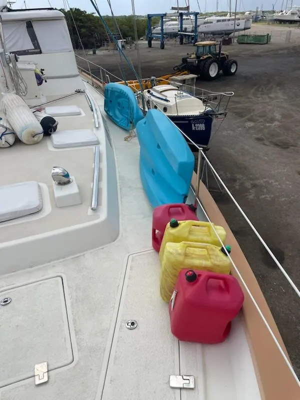 Slide: The Image of Seaton Custom Ketch 2014 on deck with fuel containers and equipment. - 10